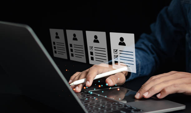 Man selecting profile in the recruitment process. Human resource management (HR), recruiting, leadership and team building.
