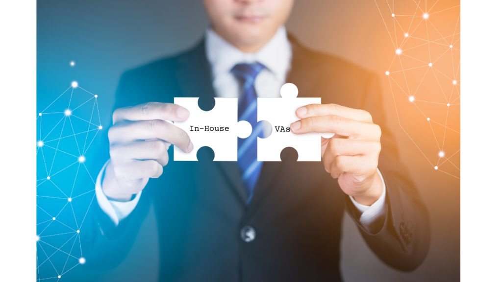 A business professional in a suit holds two puzzle pieces that fit together, labelled 'In-House' and 'VAs,' against a background of interconnected digital nodes in blue and orange tones. This symbolises the integration of virtual assistants with in-house teams. Learn how to start building and managing a hybrid team with VAs effectively.