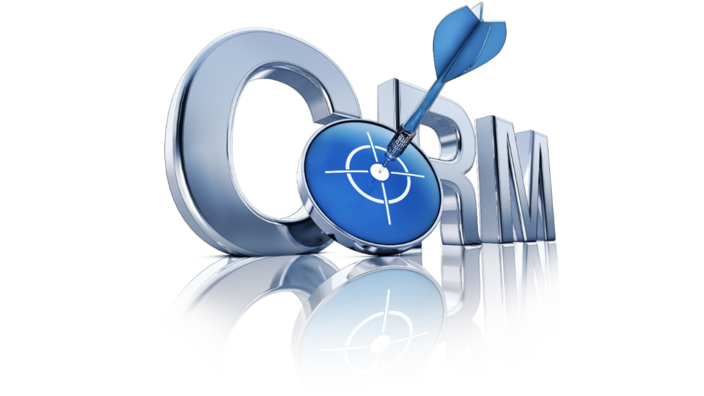 A sign saying CRM with a target and dart hitting the bullseye. This image represents choosing the right CRM system for your business needs, and hitting the bullseye when you do as you will save time, money and stress.